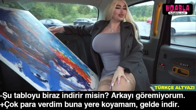 silikon memeli evli kadin bindigi takside sofore is atiyor.jpg